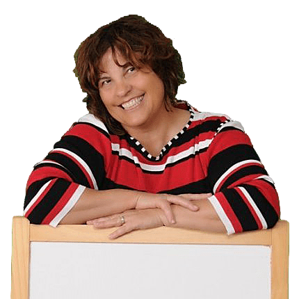 A woman leaning on a sign with her arms crossed.